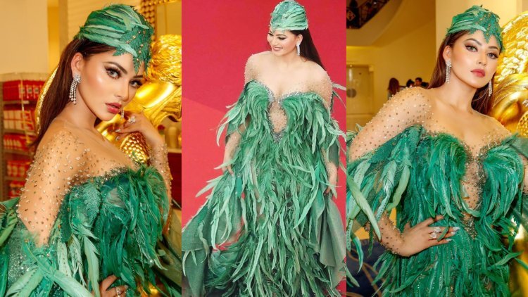 "Cannes Film Festival: Urvashi Rautela stuns in Ziad Nakad's extravagant green feather headgear, turning heads on the red carpet"